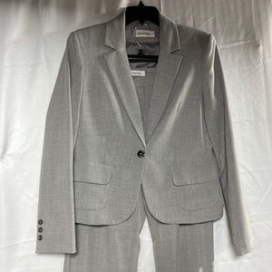Calvin Klein light gray SUIT size 10. 31” inseam. Lightly used.